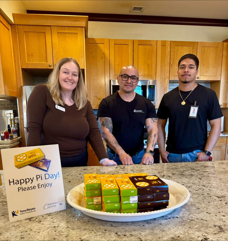 CartonCraft team celebrating Pi Day with apple pie delivery at Ronald McDonald House Chicagoland